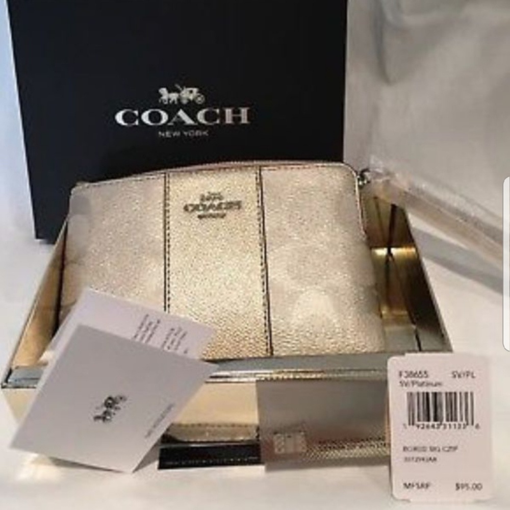 100% authentic coach wristlet